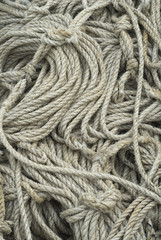Grey-colored bundles of rope.
