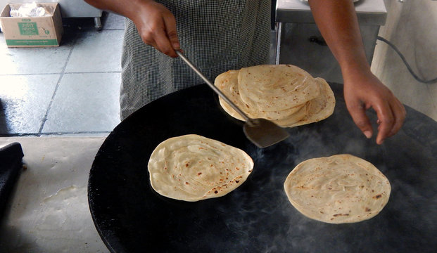 Making of Indian street food or flat bread -Parrota
