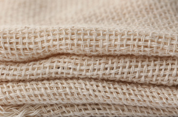 Folded hemp cloth texture, closeup