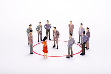 Miniature business people in conection scheme over white backdrop or background.