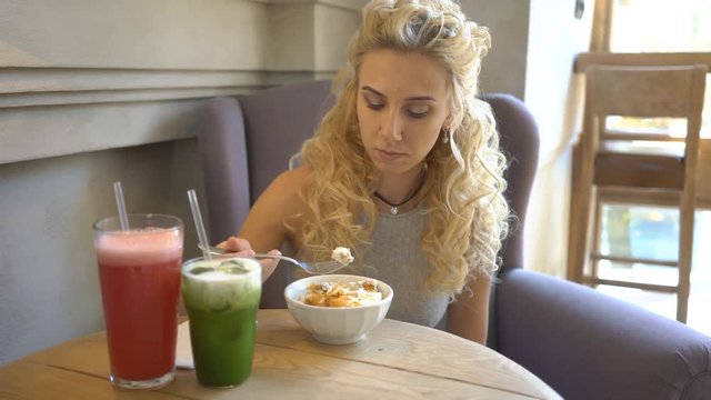 4K Blonde Woman Eating A Sweet Dessert