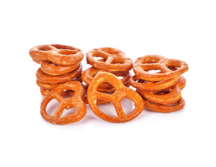 Salted pretzels on white background