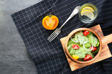 Delicious vegetable salad on table