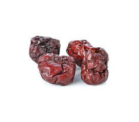 Dried jujube fruits on white background