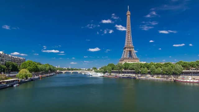 The Eiffel tower timelapse hyperlapse from bridge over the river Seine in Paris