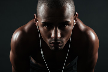 Close-up photo of serious afro american sports man