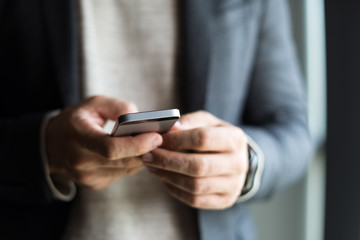 Business man using mobile phone