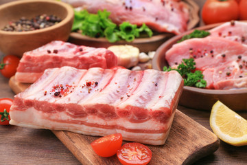 Fresh raw ribs on wooden board