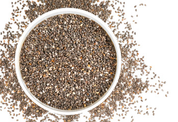 Bowl with chia seeds on white background