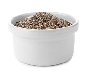 Bowl with chia seeds on white background