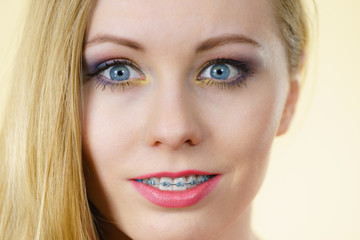 Woman having colorful makeup