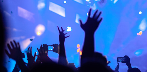 The hands of people at the concert