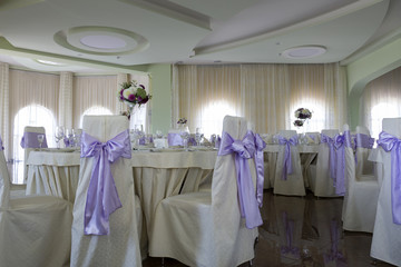 Fragment of the interior of the restaurant, decorated for the wedding