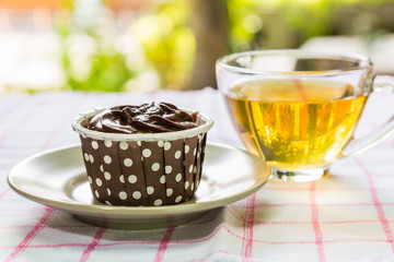Chocolate cupcake and tea