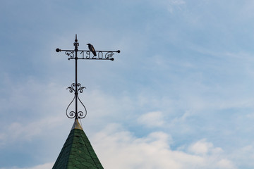 Iron weather vane year 1920 with bird  