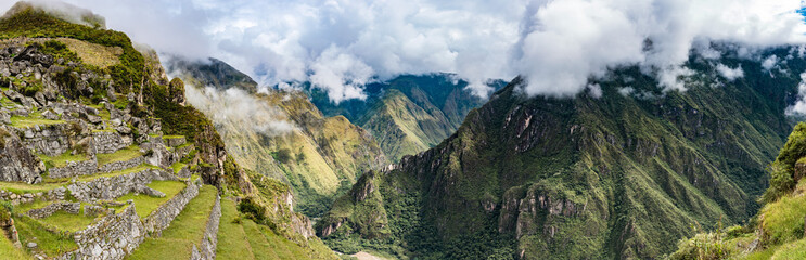 Panoramic view from Machu Picchu terrace to river valley