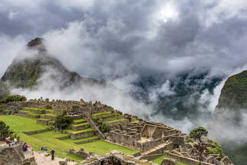 Fototapeta na wymiar East side of Machu Picchu with rain clouds