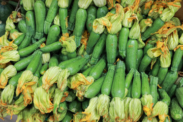 Fresh zucchini with bells in the grocery store.