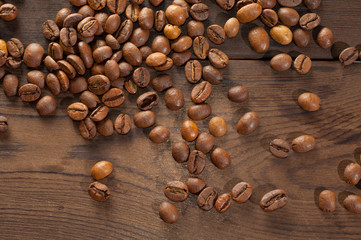 Coffee beans on a wooden background