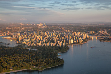 Fototapeta premium Aerial view of the Downtown City Landscape during a colorful and vibrant sunset. Taken in Vancouver, British Columbia, Canada.
