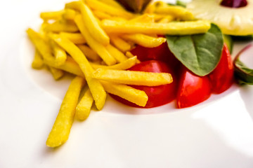 Golden French fries potatoes ready to be eaten