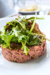 tasty Steak tartare (Raw beef) - classic steak tartare on white plate