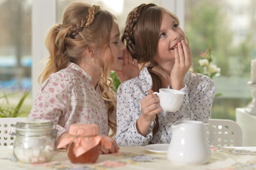 little girls drinking tea 