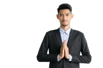Asian businessman pay respect on white background