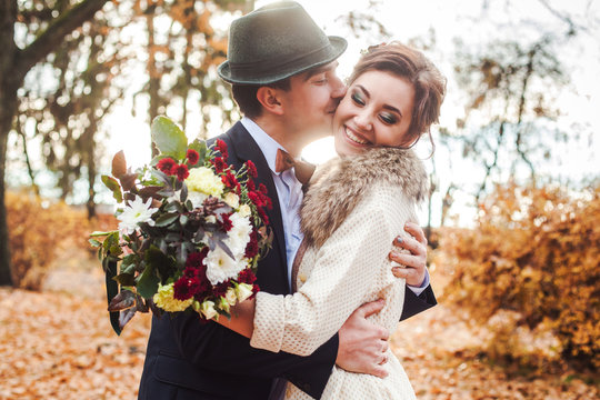 Couple In Love Celebrating Wedding In Autumn