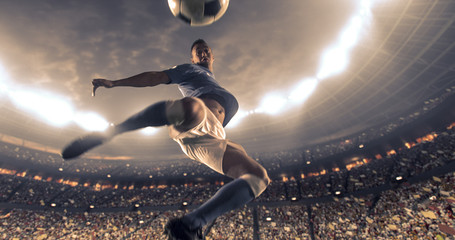 Soccer player kicks the ball on the soccer stadium. He wear unbranded sports clothes. Stadium and crowd made in 3D. © haizon