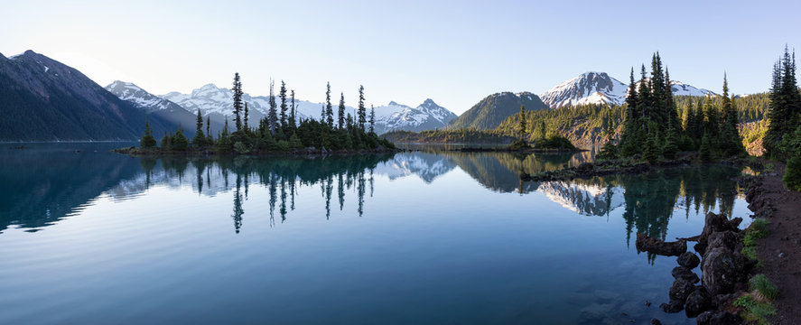 Beautiful morning view on a famous hiking spot, Garibaldi Lake, during a vibrant summer sunrise. Located near Squamish and Whistler, North of Vancouver, BC, Canada.

