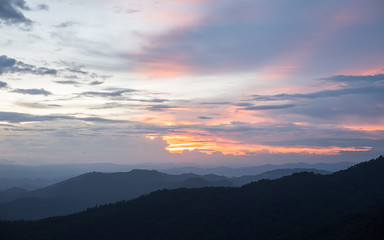 Fototapeta na wymiar Beautiful dusk scene on the mountain in Doi Pui Chiangmai, Thailand at sunset.