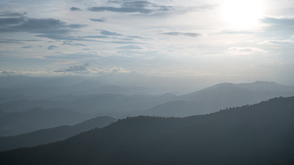 Naklejka premium Beautiful dusk scene on the mountain in Doi Pui Chiangmai, Thailand at sunset.