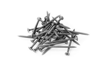 a pile of black screws isolated on white background
