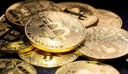 Golden shining bitcoins background