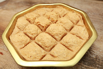 turkish tahini halva in an iron pot