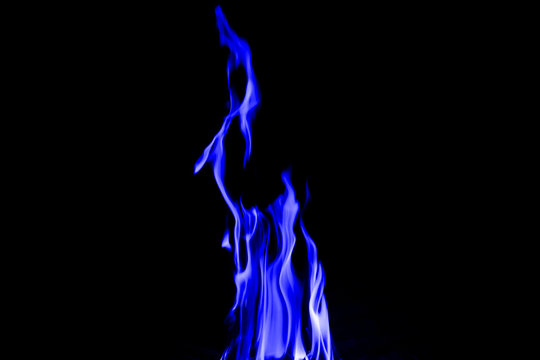 Abstract blue  Fire flames on dark background.