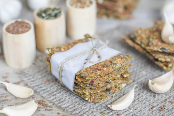 Healthy snack: cereal crunchy multigrain cereal flax seed pumpkin, coriander, sunflower seeds protein bread bar. Protein albumen source. Salted diet crispy crackers. Wholemeal.