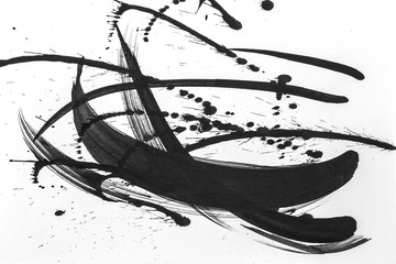 Obraz premium Abstract brush strokes and splashes of paint on white paper. Watercolor texture for creative wallpaper or design art work, black and white colors.