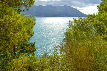 Fototapeta na wymiar Sea view of turquoise color from the mountain, Montenegro. The Budva Riviera. Becici