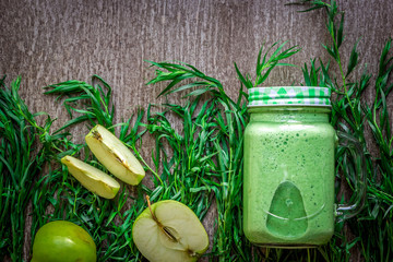 Green smoothie with spinach and apples in glass
