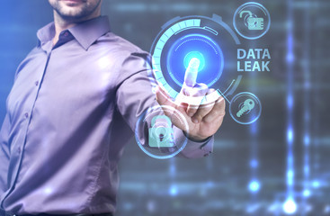 The concept of business, technology, the Internet and the network. A young entrepreneur working on a virtual screen of the future and sees the inscription: Data leak