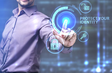 The concept of business, technology, the Internet and the network. A young entrepreneur working on a virtual screen of the future and sees the inscription: Protect your identity