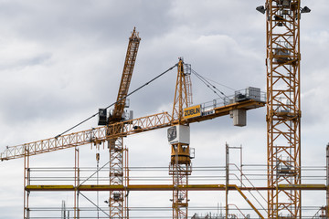 Fototapeta na wymiar Cranes on construction site