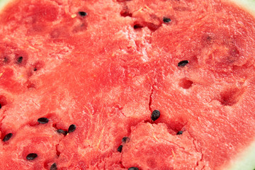 Chopped pieces of watermelon on a white plate