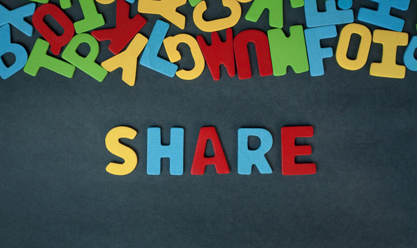 Colorful word share on a blue background. Business concept.