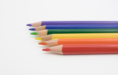 Six Rainbow Colored Pencils in a Row