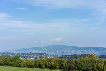 landscape of lake zurich in summer from hiking trail switzerland tourism travel destination nature blue sky