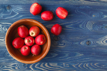 Fresh ripe red apples in bowl