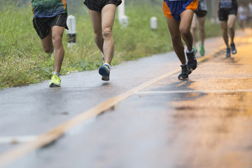 Marathon runners on the road the day it rained.